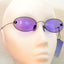 Oval sunglasses with purple lenses