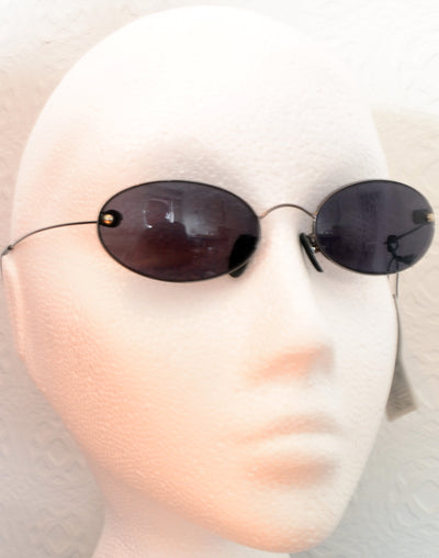 Oval sunglasses with black lenses