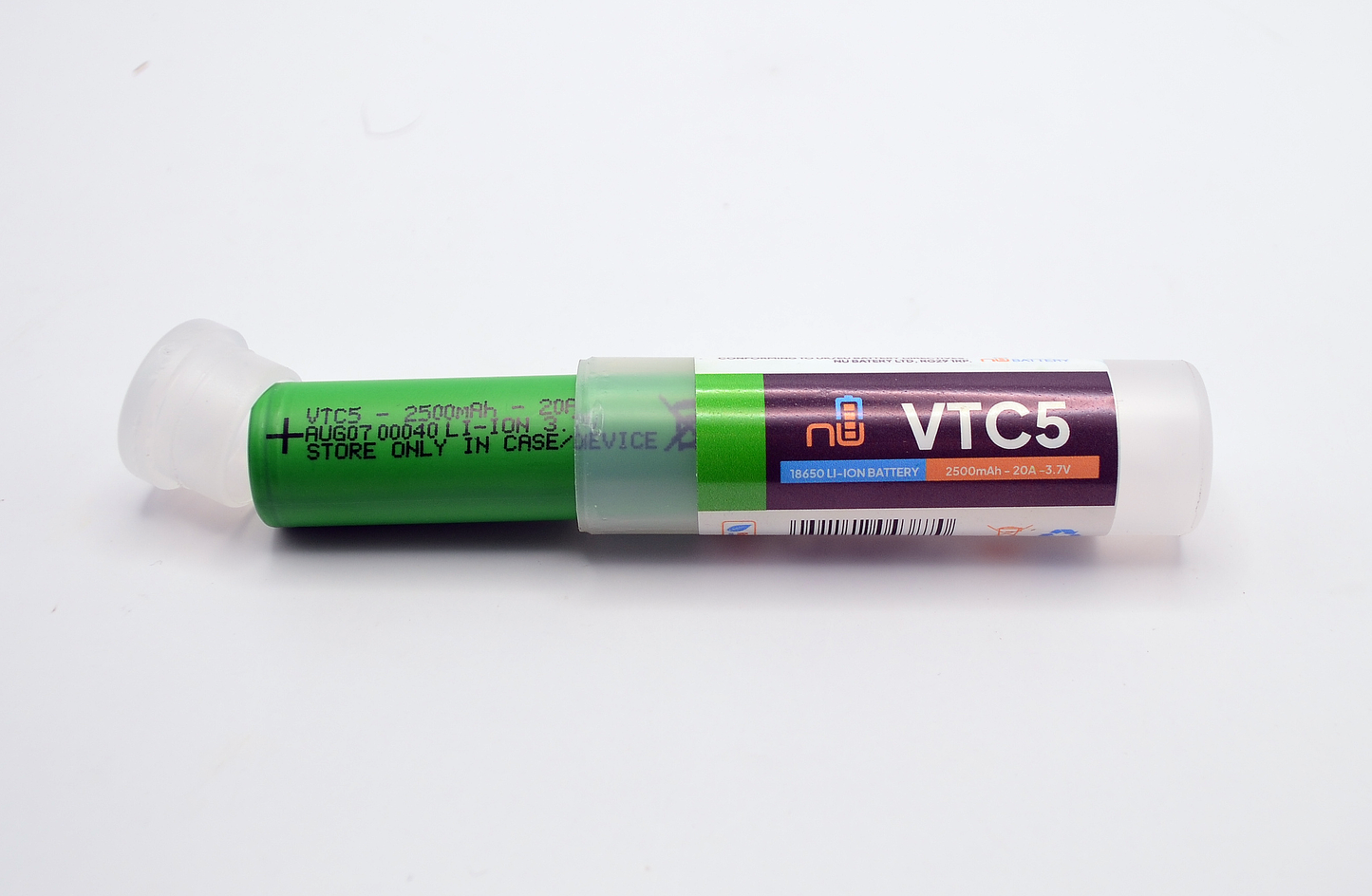 VTC5 18650 Battery in green casing with protective storage tube.